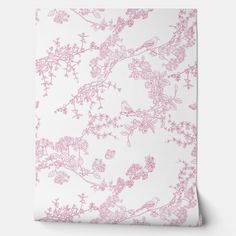 a pink and white wallpaper with flowers on it