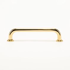 a gold handle on a white background