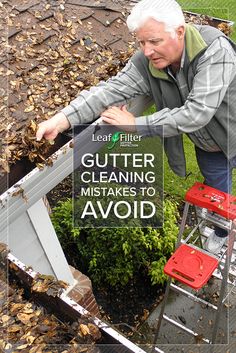 an older man is cleaning the gutter