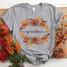 Personalized grandma flower autumn T-Shirt If you looking for a personalized t-shirt to show your love to your family, it's will be best choice. Our Classic T-Shirt serves as the perfect short-sleeved shirt for your unique, funny, or personalized designs. Features such as a lay flat collar and a classic unisex cut will make this your new favorite t-shirt. Brand: Gildan Heavy weight fabric Classic unisex makes this an easy fit Size up if you want something roomier Our shirts include: - Sport Grey White Azalea, Quilt Size Chart, Personalized Grandma, Grandma Shirts, Kids Halloween, Quilt Sizes, Halloween T Shirt, Fall Shirts, Personalized T Shirts