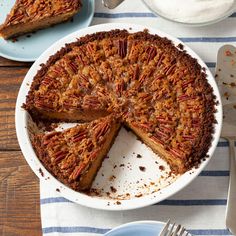 a pecan pie with one slice cut out