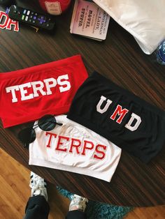 three t - shirts with the words umd and uteps printed on them