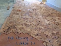 the floor is being laid out and ready to be installed in the living room area