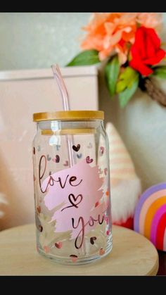 a glass jar with the words love you on it