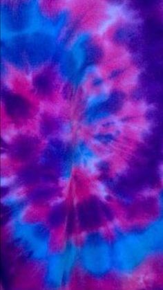 a purple and blue tie dyed background