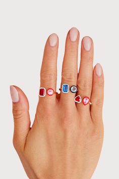 Make a statement day or night. This ring adds the perfect amount of sparkle to any occasion. Features a rectangular and round lab-created gemstone with contrasting colored enamel. Modern Gemstone Party Rings, Modern Enamel Jewelry With Gemstone, Modern Enamel Ring For Anniversary, Gemstone Enamel Ring, Modern Multi-stone Rectangular Jewelry, Modern White Rings For Party, Modern Rectangular Rings With Accent Stones, Modern White Party Rings, Modern Ring With Rectangular Accent Stones