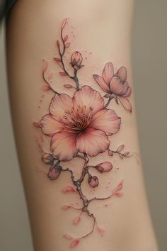 a woman's stomach with pink flowers on it