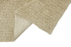 Less is more. The Tundra rug is made in a soft 2 cm long wool pile, interrupted by rows of longer piles crossing over. Available in solid Sheep White color or in blended yarns of Sheep White + Sheep Grey, or Sheep White + Sheep Beige, achieving light elegant color shades. Wool Shag Rug, Colour Shades, Lorena Canals, White Colour, Beige Rug, Beige Area Rugs, Less Is More, Color Shades, Washable Rugs