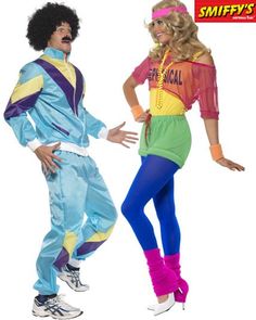 two people dressed in costumes standing next to each other