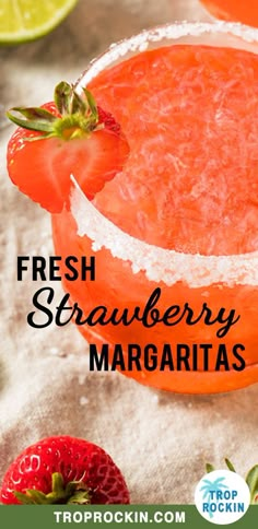 fresh strawberry margaritas with strawberries in the background and text overlay reading fresh strawberry margaritas