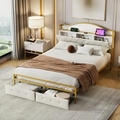 a bedroom with a bed, nightstands and large windows