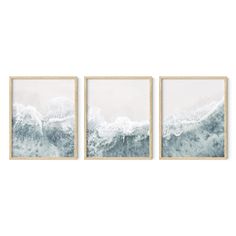 three framed paintings depicting waves in the ocean