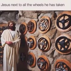 jesus next to all the wheels he has taken