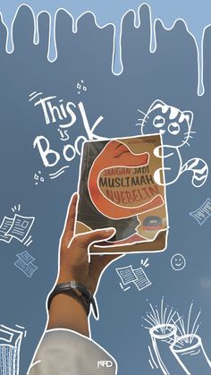 a person holding up a book in front of a blue sky with white writing on it