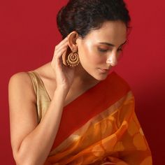 About the Jewelry Looking for earrings that give you a traditional look with a pinch of the modern Indian chic? Kalpa is what you need. Crafted beautifully with various patterns and texture these chaandbalis makes you look elegant in the best way possible. Styling Tip A semi-ethnic attire or a tunic will go perfectly with these earrings. Details & Specifications: Materials used: Brass Metal with Antique Plating Weight - Earrings 21 gm Length - Earrings 6 cm Make it custom Want to make it a custo Navratri Drop Danglers, Cutdana Earrings For Navratri, Navratri Cutdana Earrings, Festive Chandbali Hoop Earrings, Festive Fusion Style Hoop Earrings, Festive Fusion Hoop Earrings, Gift Danglers For Navratri, Cutdana Earrings For Puja And Navratri, Cutdana Earrings For Puja During Navratri