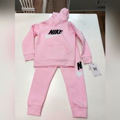 Pretty Pink With Nike Logo. Hoodie And Pants. Pink Cotton Hooded Sets, Pink Cotton Sets For Winter, Pink Cotton Winter Sets, Playful Pink Winter Sets, Hooded Pink Cotton Sets, Nike Long Sleeve Loungewear Sets, Nike Loungewear Sets, Nike Loungewear Sets For Winter, Nike Winter Loungewear Sets