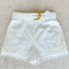 Gorgeous Zimmermann Embroidered Shorts Bought At A Zimmermann Boutique. - White / Ivory Linen - Gorgeous Embroidery - Scalloped Prefect Hem - Lined For Full Coverage - 100% Authentic Condition: - New - With Tags - Comes With Belt! Size: Australian Size 3 = Us 10 Fit: True To Size (Best Fit For A Us Size 8 To 10) Elegant White Embroidered Bottoms, Chic White Bottoms With Floral Embroidery, Summer Cream Bottoms With Floral Embroidery, Cream Floral Embroidery Bottoms For Summer, Summer Floral Embroidery Cream Bottoms, Fitted White Embroidered Bottoms, White Embroidered Short Length Bottoms, White Embroidered Bottoms Short Length, Chic Embroidered Summer Bottoms