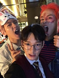 three young boys dressed up as characters from harry potter