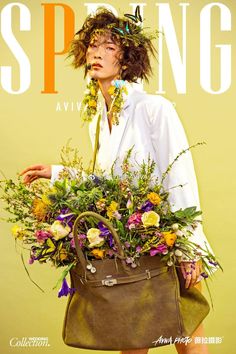 a woman is holding a purse with flowers on her head and the cover of spring