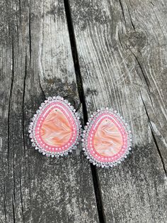 Beaded white and pink teardrop earrings with size 11 beads. Edged with crystal banding and backed with faux leather. Fingernail posts. Beaded Earrings Native Beadwork, Pink Beaded Earrings, Seed Beads Jewelry, Beads Inspiration, Beaded Earrings Native, Native Beadwork, Jewelry Inspo, Bead Weaving, Beads Jewelry