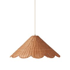 a light that is hanging from a ceiling fixture with a wicker pattern on it