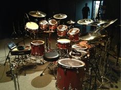 a drum set up in the middle of a room