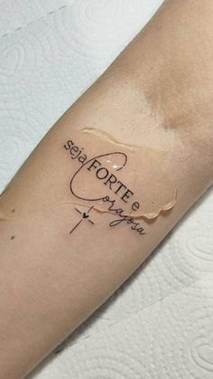 a woman's arm with a tattoo on it that reads, forte de vaca