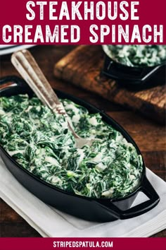 a skillet filled with spinach and cheese on top of a white napkin next to a