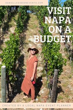 a woman standing in front of rows of vines with the words visit napa on a budget