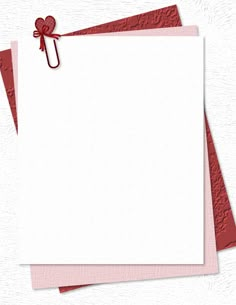 three red and white papers with paper clips attached to them