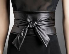 Very SOFT elastic wide black belt. Made from effective fabric, looks like faux leather. Have a look at the same belt in Infinity Style here: https://www.etsy.com/listing/89109475/leather-look-wide-black-belt-fabric-belt?ref=shop_home_active_4 Note: it's not from faux leather! Elegant Luxury Belt For Office, Luxury Bottoms With Belted Cuffs For Workwear, Luxury Leather Belts For Formal Wear, Luxury Classic Belts For Semi-formal Occasions, Luxury Belted Bottoms For Women, Luxury Black Belted Dress For Spring, Luxury Black Chic Belted Dress, Luxury Party Belted Dress For Women, Luxury Party Dress With Belt