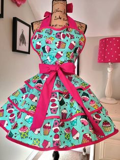 an apron dress with cupcakes on it