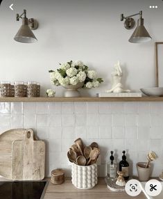 the kitchen counter is clean and ready to be used as a place for utensils