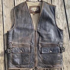 Vintage 80’s/90’s. Oversized Leather vest with wool backing and Sherpa lining very good condition with supple leather 

issue is the sizing, marked as medium but has a length and width of about 26 inches so I’d think it would fit best as a sizes 2x 3x Riding Vest, Leather Vest, Men's Vest, Sherpa Lined, Men's Coats And Jackets, Mens Vest, Vintage Leather, Mens Coats, Vest Jacket