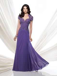 a woman in a long purple dress