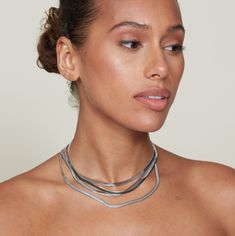 An elegant yet timeless 3mm silver herringbone chain necklace and bracelet combo for all your stylish needs! A timeless accessory to fit any personality, so you can rock it however you like. Look good, feel good, and get out there and do you! Stainless Steel Measurement Necklace:16" Bracelet: 6" Lobster Closure 100% Eco-Friendly; No Nickel, Chromium and Lead Water-resistant, sweat-proof, hypoallergenic and tarnish-free. You can work out in our durable jewelry, wear it to the beach, pool or even Chains Layered, Fun Pendant, Bracelet Combo, Herringbone Chain, Herringbone Necklace, Forever Jewelry, Silver Chains, Look Good Feel Good, Necklace And Bracelet