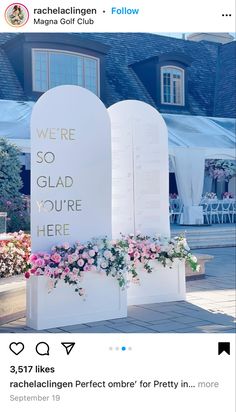 two white tombstones with flowers on them and the words we're so glad you're here