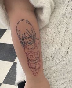 a person with a tattoo on their arm