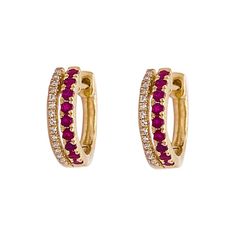 These gorgeous ruby and diamond earrings have 18 rubies and 30 diamonds. The diamonds make a border on either side of the rubies. The rubies are an amazing red color that is bright and commands attention. The earrings hug your earlobe and have a hinge so that it is securely fastened to your ear. The hinge will click in place and then you know that you are ready to do anything with your earrings on!Earrings: 1 SetMetal Quality: 14 Karat Yellow GoldEarring Type: Hoops/HuggiesHoop DIameter: 12.34 m Ruby Hoop Earrings, Ruby And Diamond Earrings, Rubies And Diamonds, Gold Huggies, Diamond Huggie Earrings, Ruby Earrings, Gold Necklace Designs, Ruby Jewelry, Star Jewelry