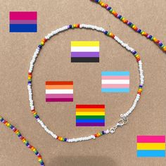 Rainbow Pride Necklace | Beaded Rainbow Necklace -14 inches  -basic lobster clasp, non-stretchy  -nickel free metal materials  -made with white beads and accent coloured beads  🏳️🌈similar pride necklaces🏳️ https://www.etsy.com/ca/listing/965150064/ custom flag? message me which flag you'd like and i'll provide photos of colour shades i have in stock :) shipping: untracked ♻️eco packaging  tags: pride necklace free shipping rainbow aesthetic jewelry beaded necklace rainbow jewelry pride jewelry Pride Jewelry Diy, Collares Aesthetic, Beaded Rainbow, Pride Necklace, Making Bracelets With Beads, Pride Jewellery, Colour Shades, Bracelets Patterns, Eco Packaging