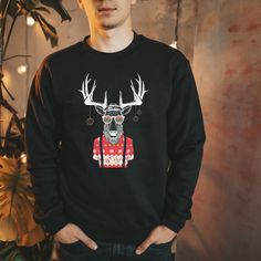 Deer Sweatshirt Ugly Christmas Sweater for Men Boyfriend Husband Christmas Trendy Mens Crewneck Christmas Shirts for Men Vintage Deer Shirt Detailed pencil sketch of a hipster deer! Ideal for any situation, a unisex heavy blend Gildan crewneck sweatshirt is pure comfort. These garments are made from polyester and cotton. This combination helps designs come out looking fresh and beautiful. The collar is ribbed knit, so it retains its shape even after washing. There are no itchy side seams on thes Cricut Christmas Shirts Men, Christmas Sweaters Men, Mens Christmas Sweaters, Mens Christmas Outfit Casual, Mens Christmas Party Outfit, Mens Funny Christmas Sweater, Christmas Outfit Aesthetic, Christmas Outfit Men, Men’s Christmas Sweatshirt