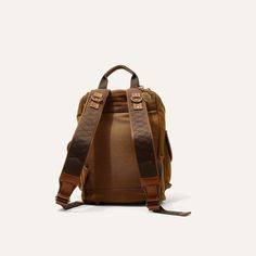 Built to travel with you everyday, with tons of space and a padded back, our rugged Lennon Backpack is comfortable and sturdy enough to tag along no matter where you are headed. Equally as suited for the office as it is for the trail. Constructed from full grain vegetable tanned leather and 18 oz 100% cotton canvas the bag is built to last and will only get better with age. Dimensions: 12” x 16” x 8.5” Weight: Approx. 4 lbs Full-grain vegetable-tanned leather & 18 oz. cotton canvas Interior lapt Travel Leather Backpack In Cognac With Leather Handles, Rectangular Leather Trim Backpack For Travel, Rectangular Leather Backpack With Leather Trim For Travel, Rugged Leather Travel Backpack With Adjustable Strap, Rugged Leather Backpack For Travel With Adjustable Strap, Cognac Leather Backpack With Leather Handles For Travel, Leather Backpack With Leather Trim For Everyday, Classic Backpack For Everyday Carry, Functional Brown Bags For Everyday Carry