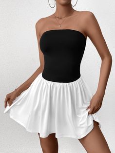 The classic black and white color scheme is simple and individual, and it is easy to attract attention. The bold strapless design shows off the elegant shoulder line and adds a touch of sensuality. The delicate pleated design is not only beautiful, but also flatters the body and accentuates the curves. The open design at the back adds a touch of mystery and allows you to feel confident in any occasion. The attractive design makes it the perfect choice for parties or nightclubs. Pair it with classic heels or stylish sandals to elevate the elegance of the look. Pair your bold eye makeup with a natural lip color to accentuate your glamorous look. Dahlia Black, Tube Mini Dress, Mini Tube Dress, Natural Lip Colors, Ruched Mini Dress, Natural Lip, Clean Body, Classic Heels, Stylish Sandals