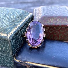 Vintage Amethyst Ring sold by Doyle and Doyle an antique and vintage jewelry boutique Vintage Amethyst Ring, Filigree Diamond Ring, Amethyst Ring Vintage, Vintage Wedding Band, Orange Sapphire, Amethyst Ring, Vintage Wedding, Vintage Rings, Sapphire Ring