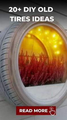 the tire is painted with red flowers and lights on it, as well as an advertisement for