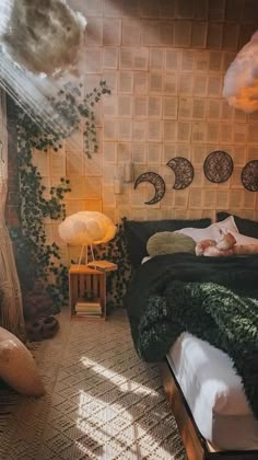 a bed room with a neatly made bed and lots of plants on the wall next to it