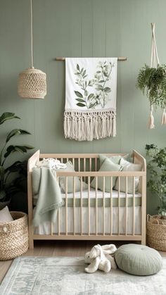 a baby's room with green walls and rugs on the floor next to a crib