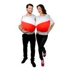 a man and woman are holding their stomachs in the shape of an orange and white ball