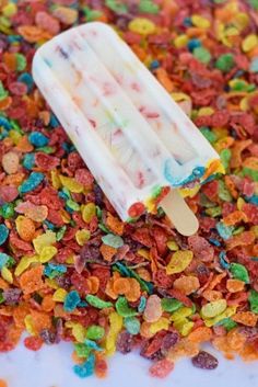 a popsicle filled with colorful candy cornflakes