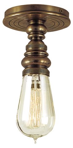 a light fixture with an old fashioned bulb